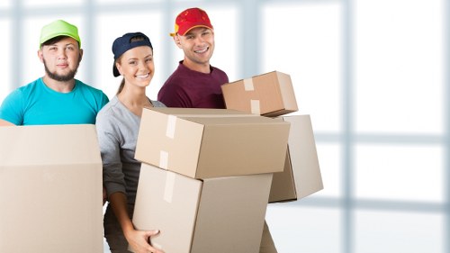 Man and van loading boxes for a move in Brent