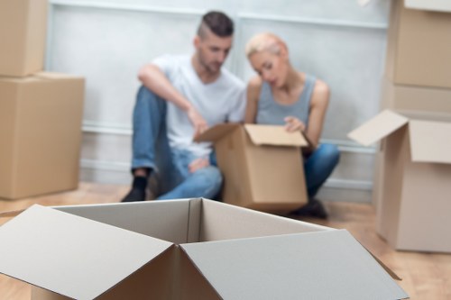 Professional movers handling furniture during a Brent house removal