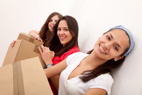 Packed household items ready for removal services in Brent