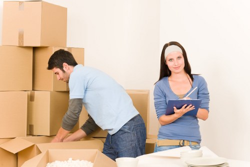 Careful loading of furniture for a move across Brent